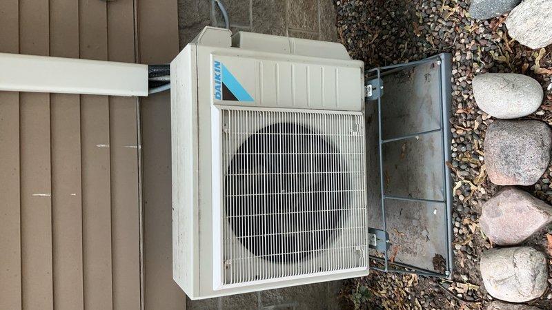Completed preventative maintenance on two mini-split systems, each with two indoor head units. Performed comprehensive tune-up including rinsing exterior condenser coils, cleaning all air filters, and clearing condensate drain lines. Verified system performance with temperature differential testing, measuring 16-degree delta-t on both units with outdoor ambient at 77°F and indoor at 68°F, confirming proper operation. Checked refrigerant levels on one unit and confirmed adequate charge; second unit's service ports were inaccessible due to furniture obstruction. Both systems operating within normal parameters. Photographed exterior condenser location per request for future relocation estimate to position unit on side of house between two windows.