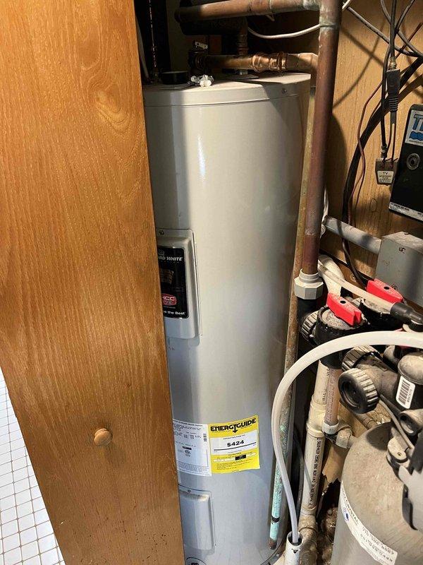 Performed comprehensive tune-up on mini split system installed approximately one year ago. Inspected indoor unit and noted blower wheel showing minor dirt accumulation but remains within acceptable operating parameters for continued service. Removed and cleaned air filter, then performed condenser coil cleaning due to dirt buildup affecting heat transfer efficiency. Inspected outdoor unit cabinet interior for pest intrusion and confirmed no rodent activity present. Reinstalled filter, energized system, and verified proper operation with 23-degree temperature differential across evaporator coil, confirming optimal cooling performance.