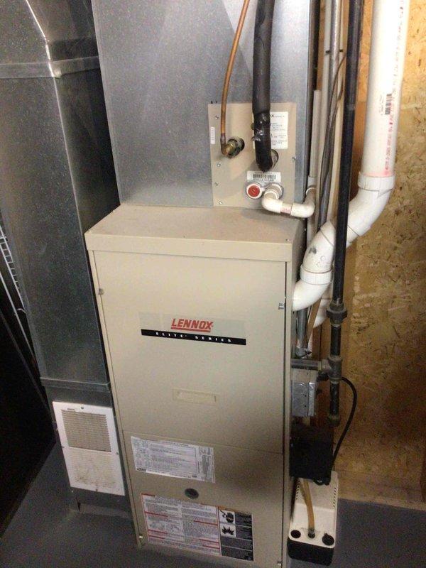 Completed routine AC tune-up on Lennox Elite Series system with outdoor condenser unit. Performed comprehensive maintenance including washing the outdoor unit, testing all electrical components and connections, and verifying system operation. All electrical readings measured within manufacturer specifications, unit operating properly, and indoor filter found to be brand new with no replacement needed.