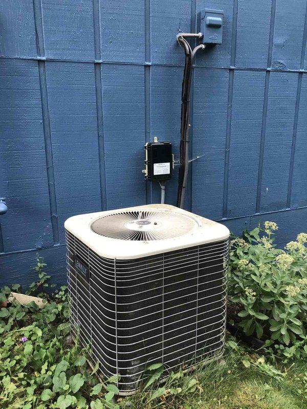 Completed routine AC tune-up on Lennox Elite Series system with outdoor condenser unit. Performed comprehensive maintenance including washing the outdoor unit, testing all electrical components and connections, and verifying system operation. All electrical readings measured within manufacturer specifications, unit operating properly, and indoor filter found to be brand new with no replacement needed.