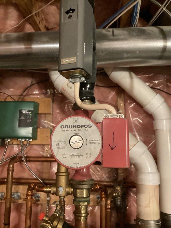 Completed comprehensive plumbing inspection including evaluation of bathroom fixtures and hot water recirculating system. Inspected shower valve assembly with chrome fixtures and porcelain handle, bathtub spout, and associated plumbing connections, confirming proper operation and no visible leaks. Examined Grundfos UP 15-18 SU hot water recirculation pump installation in mechanical space, verifying pump operation, electrical connections to control relay, copper piping integrity, brass fittings, shutoff valves, and associated PVC drainage lines, with all components functioning within normal parameters.