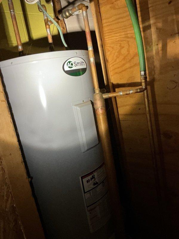 Responded to service call for two malfunctioning toilets in residential property. Downstairs toilet experiencing continuous running issue was repaired by adjusting fill valve and removing accumulated sediment from tank, restoring proper operation. Upstairs toilet with chronic drainage problems requiring frequent plunging was replaced with new Gerber ADA-compliant unit due to age and deterioration of original 40-year-old fixture. During installation, identified soft subfloor condition and applied silicone sealant around toilet base to stabilize fixture and prevent movement. Advised property owner that underlying floor structure may require future repair or reinforcement if stability issues persist.
