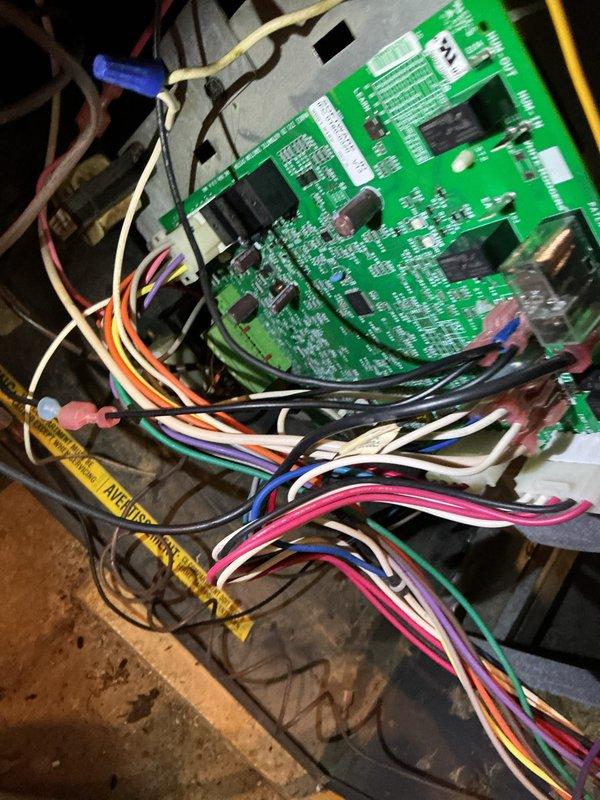 Completed routine preventive maintenance on a 13-year-old Goodman HVAC system including both furnace and air conditioning components. During inspection, identified and replaced a failed dual capacitor that was reading out of specification and a deteriorated humidifier pad. All system components tested and operating within normal parameters following repairs.