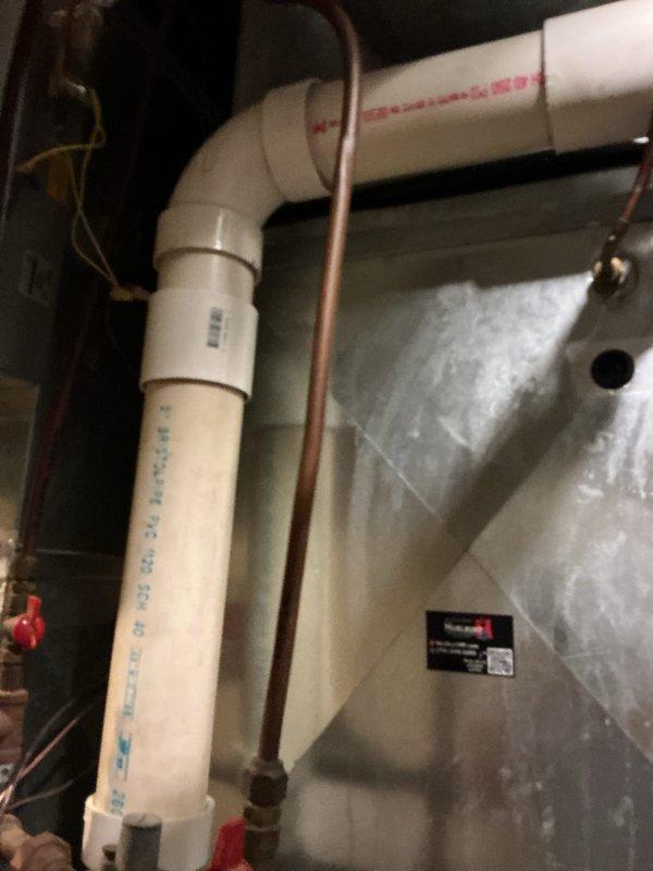 Completed routine preventive maintenance on a 13-year-old Goodman HVAC system including both furnace and air conditioning components. During inspection, identified and replaced a failed dual capacitor that was reading out of specification and a deteriorated humidifier pad. All system components tested and operating within normal parameters following repairs.
