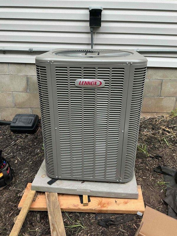 Completed warranty repair on Lennox outdoor condensing unit by replacing condenser fan motor, fan shroud, and top cover assembly. All components were installed per manufacturer specifications and secured properly. System was tested for proper operation, verifying correct fan rotation, adequate airflow through condenser coil, and normal operating sound levels. Unit is operating quietly and efficiently with all new parts functioning as designed.