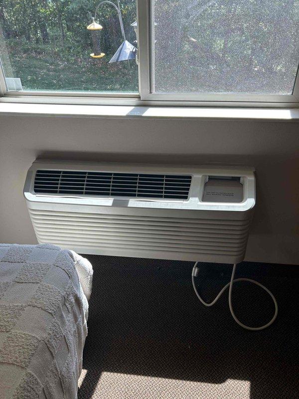 Responded to service call for excessively loud PTAC unit in room 20. Upon inspection, determined that the blower bushing had failed and separated from the assembly, causing the noise issue. Removed the damaged blower wheel and installed a replacement wheel that was available on-site, restoring quiet operation to the unit.