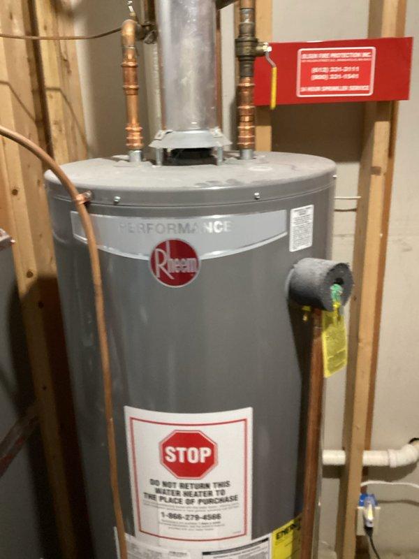 Performed leak search on non-operational air conditioning system as follow-up service call. Identified refrigerant leaks at evaporator coil and thermostatic expansion valve, documented with photos and video. Observed improper drain pan positioning with standing water present. Submitted parts order for evaporator coil replacement under warranty coverage.