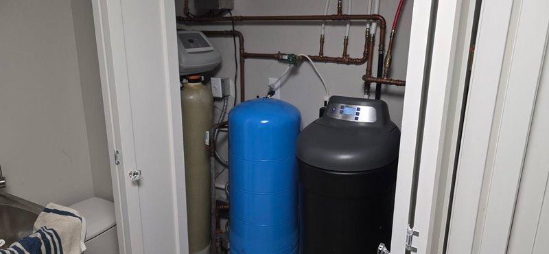 Serviced a 5-year-old Northstar water softener system that had never received maintenance and was experiencing operational issues with iron deposits and water conditioning problems. Diagnosed and addressed electrical contact failures, replaced faulty nozzle and venturi assembly which was significantly clogged with mineral buildup. System was cycled and homeowner instructed to monitor performance before scheduling follow-up appointment to verify proper operation.