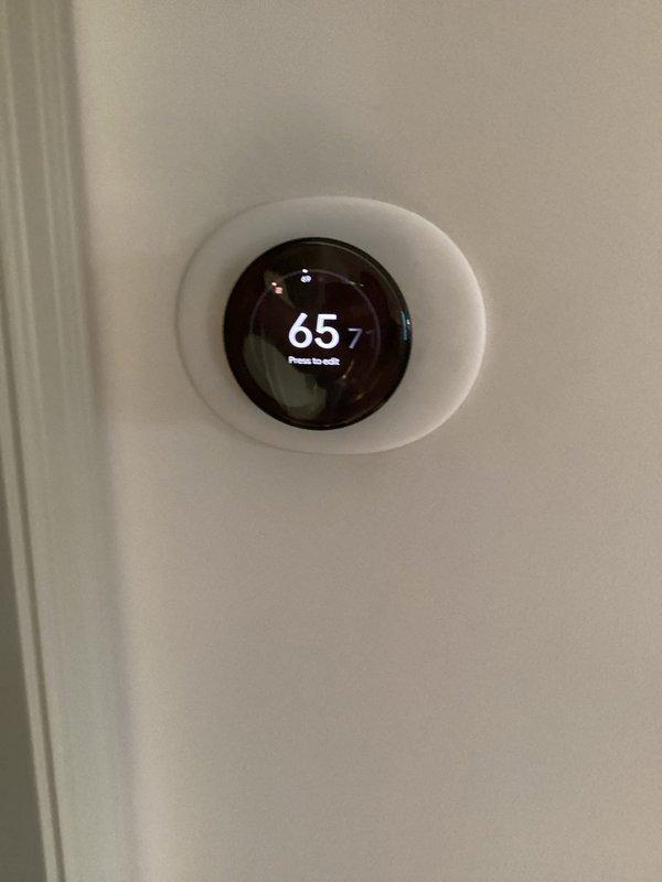 Responded to no cooling call where thermostat had no power. Found condensate wet switch in tripped position, preventing system operation. Dried out wet switch and restored power to thermostat, returning system to normal cooling operation.