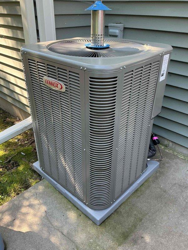 Completed comprehensive AC tune-up and inspection on 2-year-old Lennox air conditioning system as part of annual maintenance agreement. Performed full system diagnostics including contactor inspection, capacitor testing, amp draw measurements, and refrigerant charge verification—all components found operating within manufacturer specifications. Evaluated both indoor and outdoor coils; evaporator coil and blower assembly were clean, while condenser coil showed minor dirt accumulation. Replaced air filter and confirmed system performance with temperature drop measuring 20 degrees across the evaporator coil, meeting proper operational parameters. System operating efficiently with no deficiencies identified or repairs required at this time.