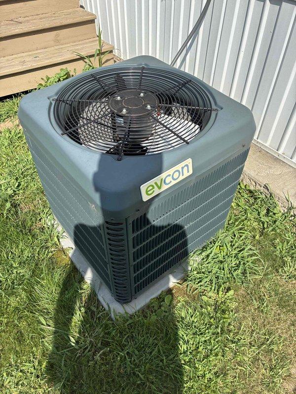 Responded to no cooling complaint on 7-year-old Evcon system under maintenance agreement. Diagnosed failed capacitor preventing condenser from starting. Replaced defective ProSelect capacitor and verified proper system operation with all components functioning correctly.