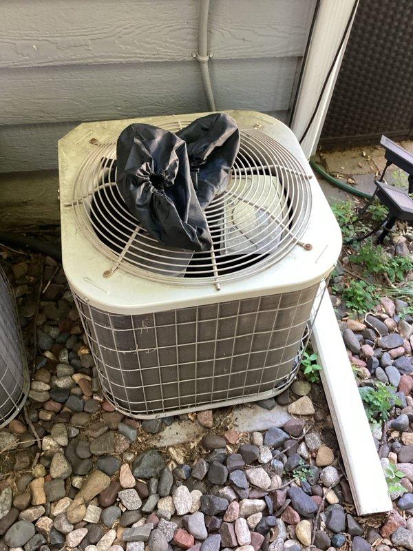 Responded to no cooling complaint on 14-year-old Payne residential condenser unit, model PA13NA024BN0. Upon arrival, found downstairs air conditioning system running but not producing cool air. Performed diagnostic evaluation and discovered failed dual run capacitor preventing compressor from operating properly. Replaced defective capacitor with appropriate replacement unit and restored system to operational status. Verified proper system operation by measuring temperature splits across evaporator coil, confirming readings within manufacturer specifications. System tested and confirmed cooling effectively post-repair. Noted existing concerns with associated furnace's secondary heat exchanger based on equipment history; recommend ongoing monitoring for safety. Provided estimate for system replacement considerations given age of equipment. Unit operational at time of departure.