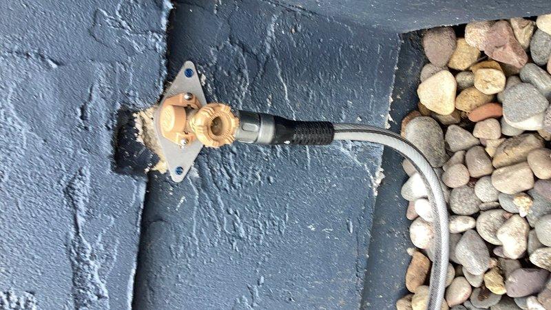 Responded to callback regarding recently replaced outdoor spigot that was rotating approximately 40 degrees in either direction. Upon inspection, confirmed spigot remained attached to wall but exhibited excessive flexibility that concerned the homeowner. Installed additional mounting bracket and reinforcement plate to eliminate movement and provide rigid, secure installation. Verified proper alignment and stability of fixture upon completion.