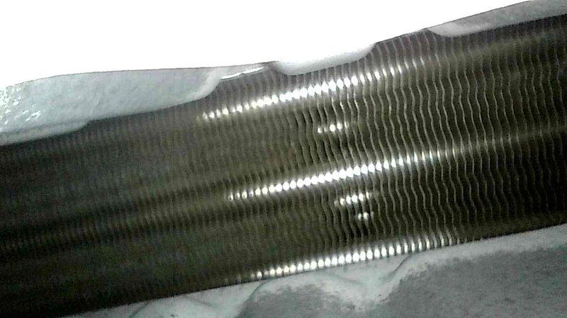 Completed routine maintenance and tune-up on FR furnace system with unit age unknown. Performed comprehensive inspection of heating equipment including examination of heat exchanger coils, which showed proper fin condition and structural integrity. All maintenance procedures documented per standard tune-up protocol and checklist requirements.