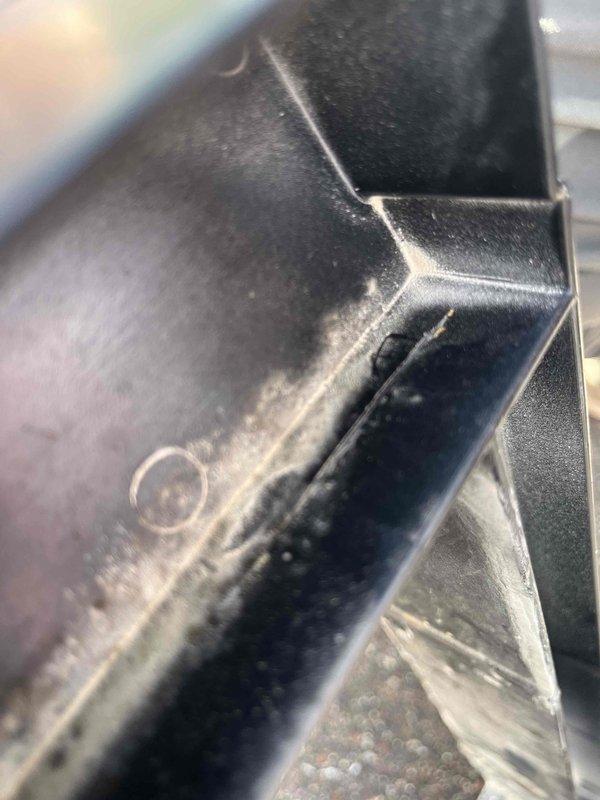 Responded to repair request for HVAC drain pan replacement. Upon inspection, discovered three cracks in the existing drain pan that were causing water leakage. Removed the damaged drain pan and installed a new replacement unit. Performed thorough water testing on the newly installed drain pan to verify proper water retention and drainage functionality. Confirmed all water flows correctly through the drain system without leakage. Job required two technicians due to equipment access and positioning requirements.
