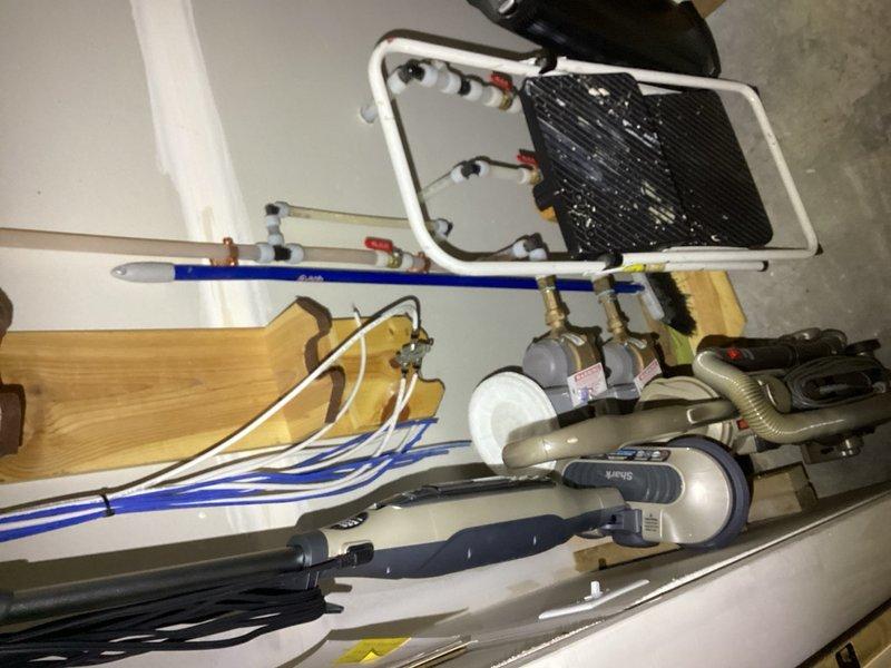 Responded to a water leak on the irrigation line at the main water supply entry point. The leak was identified at a 1" copper tee fitting located before the pressure vacuum breaker (PVB), specifically at the drain plug area of the brass valve assembly, with water dripping every 10-15 seconds. Performed a minor repipe of the copper tee connection to eliminate the leak and restore proper function to the irrigation system.