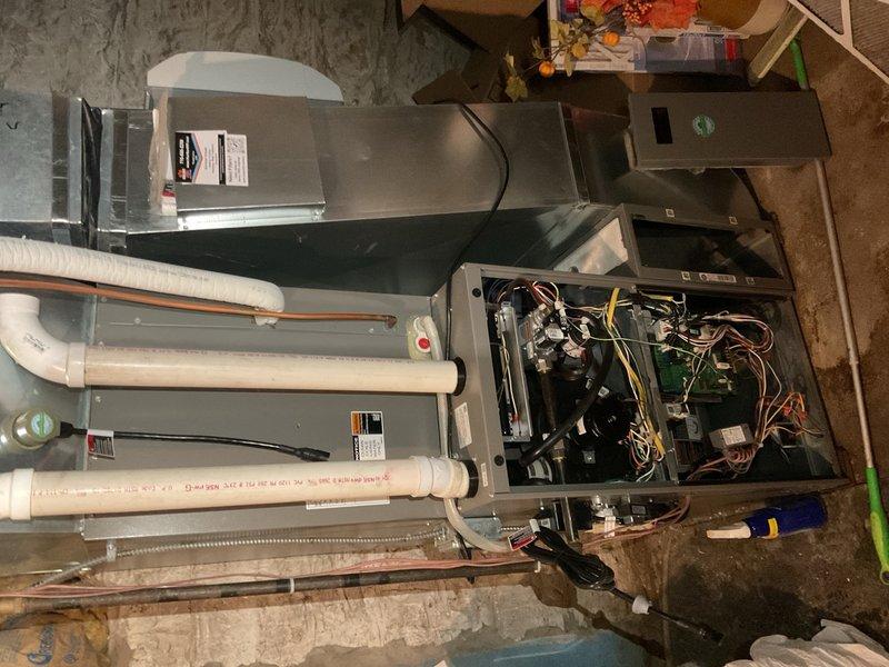 Completed annual maintenance on a 5-year-old Lennox EL296 two-stage gas furnace. Verified proper operation of hot surface igniter, flame sensor, capacitor, and gas pressure. Removed and inspected gas manifold, confirming burners were clean and free of debris. Test-fired unit and confirmed proper operation in both stage one and stage two heating modes. Inspected blower wheel and verified cleanliness. Resecured loose return ductwork to prevent air leakage. Flushed condensate trap with 40 oz of water, clearing minor debris accumulation through drain line. Identified non-operational UV bulb requiring replacement, which homeowner will provide. Advised homeowner has ordered new MERV 16 filters for installation. All systems operating within manufacturer specifications with no additional issues found at time of service.