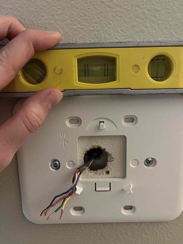 Installed a Honeywell Home ProSeries T4 programmable thermostat to replace the existing unit. Removed the old thermostat, mounted and leveled the new wall plate, connected the wiring, and secured the new thermostat to the wall. Verified proper operation of heating, cooling, and fan modes upon completion.
