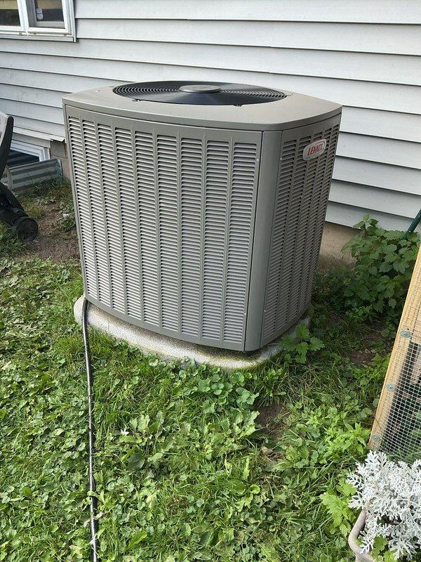 Completed air conditioning tune-up and maintenance on a 2-year-old heat pump system. Cleaned dirty condenser coil and inspected electrical connections and components. System is operating properly with no additional repairs needed at this time.
