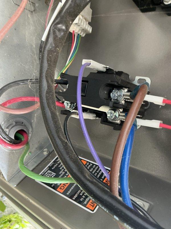 Completed air conditioning tune-up and maintenance on a 2-year-old heat pump system. Cleaned dirty condenser coil and inspected electrical connections and components. System is operating properly with no additional repairs needed at this time.