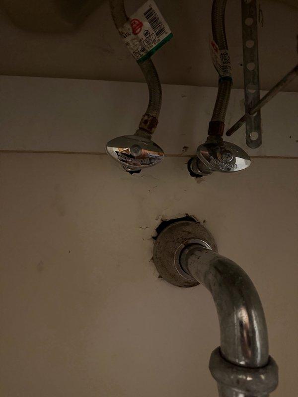 Installed customer-supplied toilet with complete plumbing connections. Replaced five angle stops (shut-off valves) with new chrome-finished fixtures and installed braided stainless steel supply lines. Reinstalled pop-up drain assembly to ensure proper function and seal. All connections tested for leaks and verified operational.