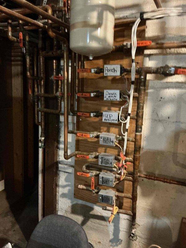 Completed annual heating tune-up on 7-year-old Lennox system and performed boiler inspection. Found boiler operational but running at low pressure; added water to system to meet manufacturer's specified pressure requirements. Inspected hydronic heating system including circulator pumps, zone valves, manifold distribution system, expansion tank, and associated copper piping—all components found to be functioning properly following pressure adjustment.