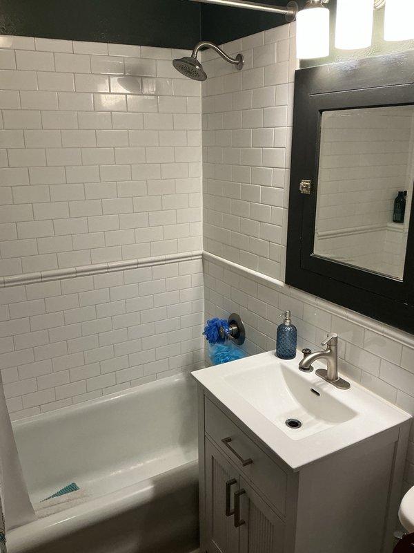 Responded to slow draining bathroom sink. Upon inspection, found drain line heavily obstructed with accumulated buildup of hair, soap residue, and organic matter. Cleared blockage using appropriate drain cleaning equipment and restored proper drainage flow. Tested system to verify complete water evacuation and proper drain function. Advised property owner that drain line shows significant wear and recommended scheduling estimate for potential pipe replacement as part of planned bathroom remodeling project.