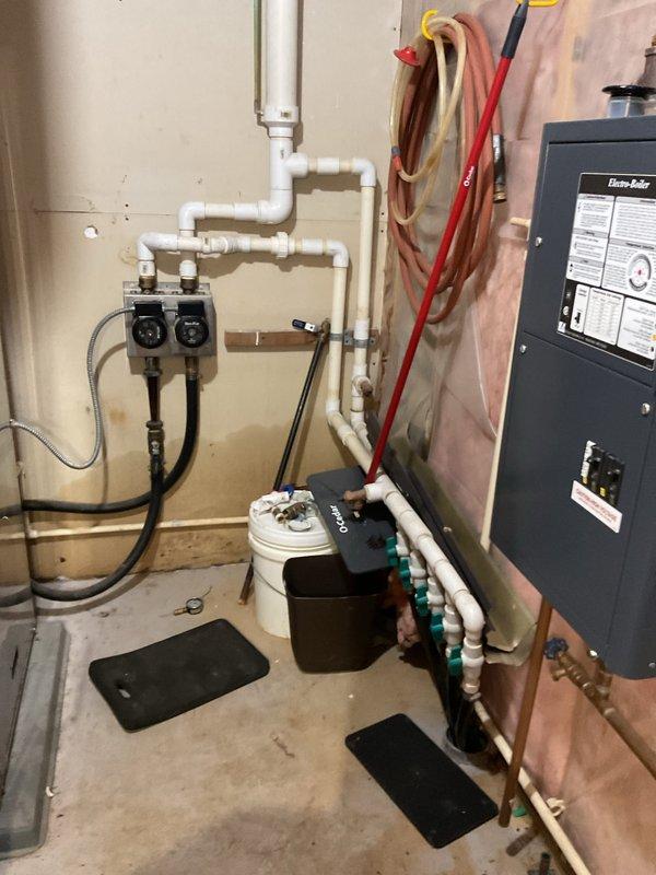 Completed seasonal tune-up on geothermal system and discovered failed Geo Link pump on left side running excessively hot, along with pitted contactor requiring replacement. Inspected in-floor heat electric boiler which operated within normal parameters. Provided estimate for contactor replacement and initiated quote process for non-stock Geo Link pump replacement.