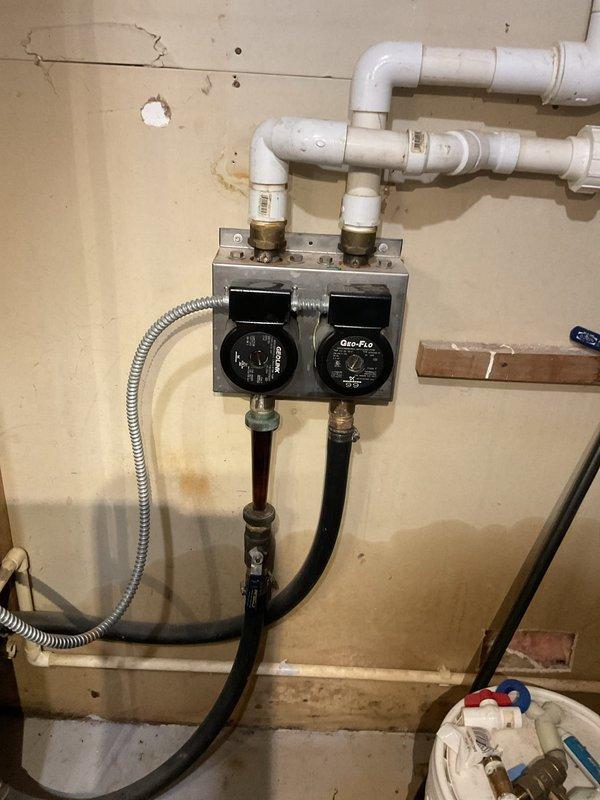 Completed seasonal tune-up on geothermal system and discovered failed Geo Link pump on left side running excessively hot, along with pitted contactor requiring replacement. Inspected in-floor heat electric boiler which operated within normal parameters. Provided estimate for contactor replacement and initiated quote process for non-stock Geo Link pump replacement.