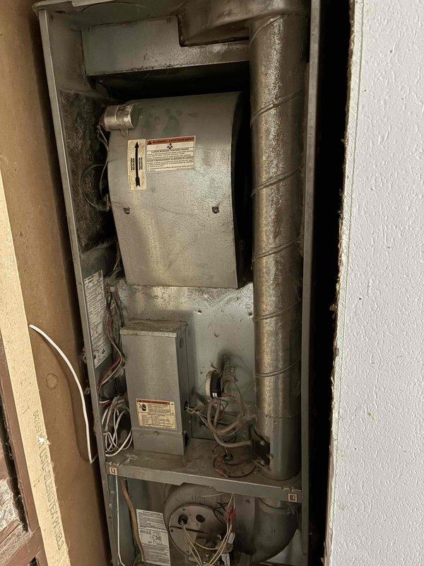 Responded to no cooling call on 2013 Revolv mobile home furnace (Model DGAA077BDTB). Diagnosed blower motor failure after verifying thermostat call for cooling, confirming control board output of 120V to motor, and testing capacitor which measured within acceptable range. Blower motor failed to start despite proper voltage supply, indicating motor winding failure. Overall system condition showed significant neglect with heavy dust accumulation and lack of maintenance. Provided repair estimate for blower motor replacement, recommended full system evaluation due to deteriorated equipment condition, but customer declined additional assessment and authorized motor replacement only. Completed parts order documentation for new blower motor assembly.
