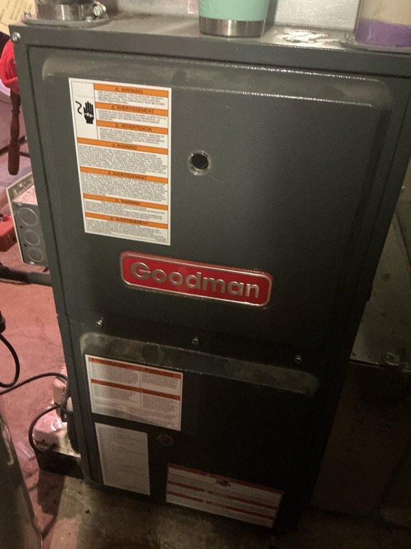 Performed comprehensive furnace tune-up and safety inspection on 12-year-old Goodman unit. Verified gas pressure and combustion parameters within manufacturer specifications, confirmed safe carbon monoxide levels in flue exhaust. Conducted heat exchanger inspection revealing temperature stress points requiring monitoring. Tested flame sensor and found current reading below 2 micro amps, indicating component failure requiring replacement. All remaining system components tested and operating within acceptable ranges. Submitted parts order for flame sensor replacement and will schedule return visit upon arrival. Recommended upgrading to MERV 7 or 8 rated air filter with monthly replacement schedule for optimal system performance. Unit remains fully operational and safe for continued use.