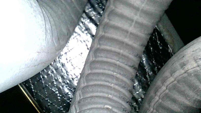 Completed heating system preventive maintenance on newer furnace found in good operating condition. Performed comprehensive tune-up including inspection of all components, combustion analysis, and safety checks with no deficiencies identified. Documented frost accumulation observed on flexible ductwork in confined space, indicating potential insulation or airflow concerns that may require future attention.