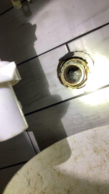Responded to a bathroom lavatory drain issue where standing water remained in the sink following customer's P-trap cleaning attempt. Upon arrival, diagnosed a plugged lavatory drain line beyond the P-trap assembly. Utilized drain snake equipment to clear the obstruction in the lavatory pipe, restoring proper drainage function. Verified drain plug assembly was correctly installed and tested system to confirm water flow was operating normally with no standing water remaining in the fixture.