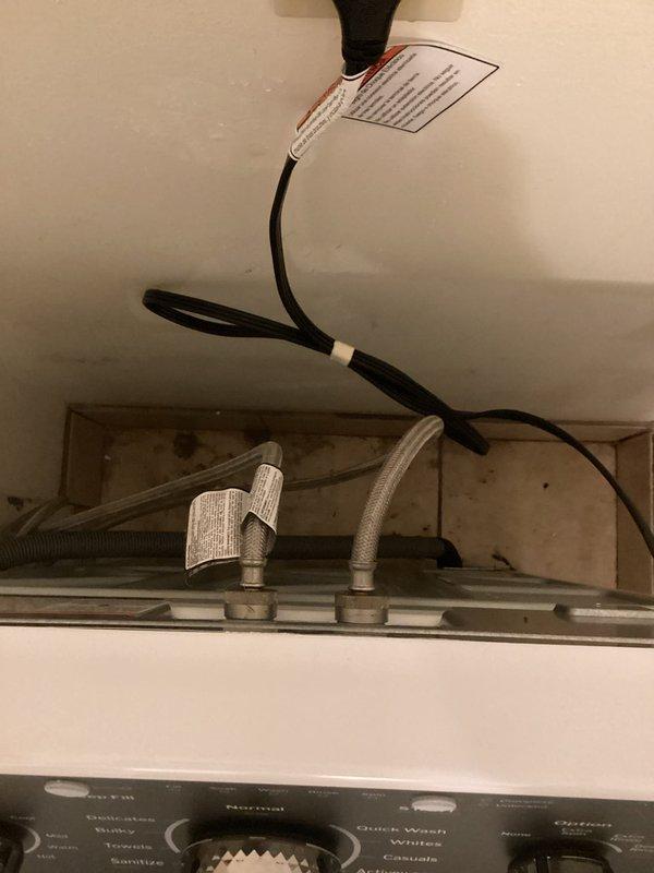 Responded to service call for corroded water supply line preventing washing machine installation. Replaced deteriorated water line feeding the washer connection, as appliance installers required updated plumbing before proceeding with equipment installation. Although the existing shut-off valves showed corrosion on exterior surfaces, they remained fully operational and did not require replacement. Completed the water line installation and successfully installed the washing machine, which had been staged outside the laundry room. All connections tested and verified leak-free with proper water flow to the appliance.