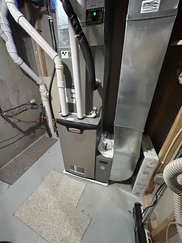 Completed comprehensive heat pump tune-up on 2-year-old Lennox system with no reported issues or operational concerns. Performed standard preventive maintenance procedures on both indoor furnace unit and outdoor condensing unit, including inspection of all major components, electrical connections, refrigerant levels, and airflow systems. All equipment operating within manufacturer specifications with no deficiencies noted.