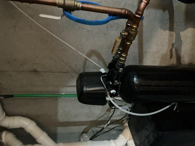 Responded to low water pressure complaint affecting kitchen faucet. Diagnosed sediment buildup in faucet aerator and clogged whole-house sediment filter as primary causes of reduced flow. Cleaned faucet head to restore proper flow rate. Identified malfunctioning softener head requiring attention. Advised customer that sediment filter replacement is needed and recommended scheduling estimate for water softener replacement due to head assembly issues.
