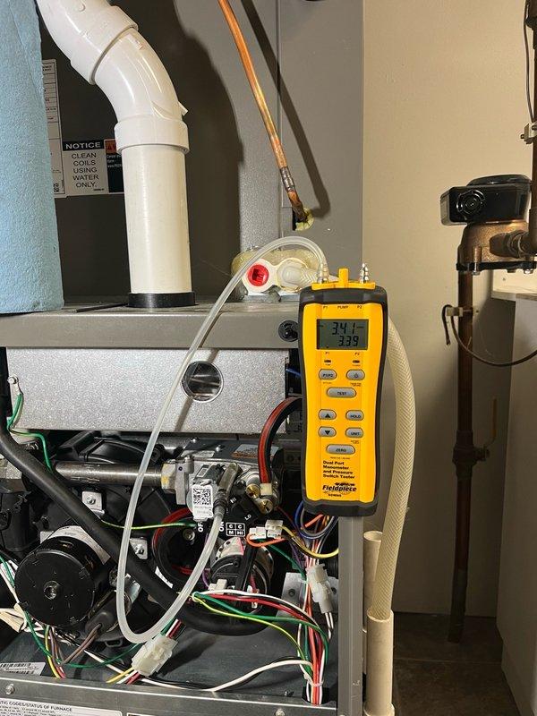 Completed comprehensive furnace tune-up and maintenance inspection as part of recurring preventative maintenance agreement. Verified all electrical components operating within manufacturer specifications and confirmed condensate drain lines flowing properly. Replaced dirty air filter with customer-supplied unit. Performed complete safety inspection including gas pressure verification at manifold, confirmed proper combustion with 65°F temperature rise across heat exchanger. Monitored system operation for 15 minutes with no issues detected. All components functioning normally with no safety concerns identified. Recommended maintaining supply of replacement filters for ongoing maintenance.