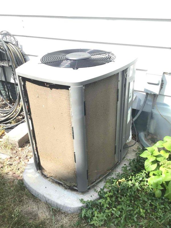 Completed comprehensive air conditioning tune-up service on residential cooling system. Upon arrival, performed visual inspection of outdoor condenser unit and identified significant accumulation of dirt and debris on coil surfaces and cabinet exterior. Customer reported elevated noise levels from outdoor fan operation prior to service.

Thoroughly cleaned and washed outdoor condenser unit, removing dirt, debris, and buildup from coil fins, cabinet surfaces, and fan assembly. Following cleaning procedure, operated system through complete cooling cycle to verify proper operation and assess performance improvements. Post-service testing confirmed outdoor fan now operates at normal, near-silent sound levels, indicating successful resolution of noise concern. System running efficiently with improved airflow and heat transfer capability due to clean condenser coil surfaces.