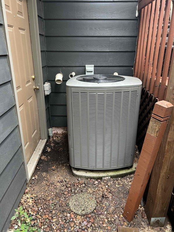 Completed comprehensive air conditioning tune-up and preventive maintenance on two Lennox outdoor condensing units. Performed standard seasonal maintenance protocol including inspection of electrical components, refrigerant line assessment, condenser coil cleaning, and operational testing per manufacturer specifications. Both units showed normal operating conditions with minor algae growth noted at base of one unit, typical for exterior installations in damp environments. All systems functioning properly upon completion.