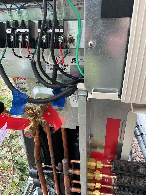 Responded to no-cool callback on recently installed mini split system. Upon arrival, diagnosed miswired indoor head units at outdoor condenser connections. Corrected wiring configuration between heads and corresponding condenser ports. After resolving wiring issue, one indoor head unit remained non-responsive. Performed voltage verification at both indoor and outdoor units, confirming proper electrical supply. Isolated fault to defective control board in non-responsive indoor head unit. Submitted warranty parts request for replacement control board.