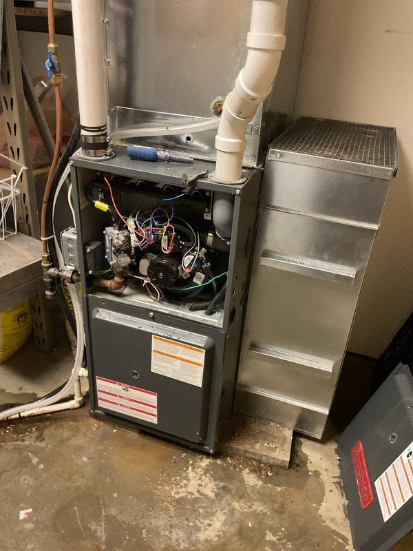 Completed comprehensive tune-up service on both air conditioning and gas furnace systems. Resolved water issue around furnace by clearing plugged condensate line and removing deceased mouse from drain pan, restoring proper drainage. Performed full inspection of A/C system including refrigerant check, component operation verification, and confirmed proper 20° temperature drop across evaporator coil.

On gas furnace, cleaned burners and flame sensor, cleared condensate system, and performed video scope inspection of heat exchanger with no defects found. Verified safe operation of all components on both systems. All equipment now operating within manufacturer specifications.