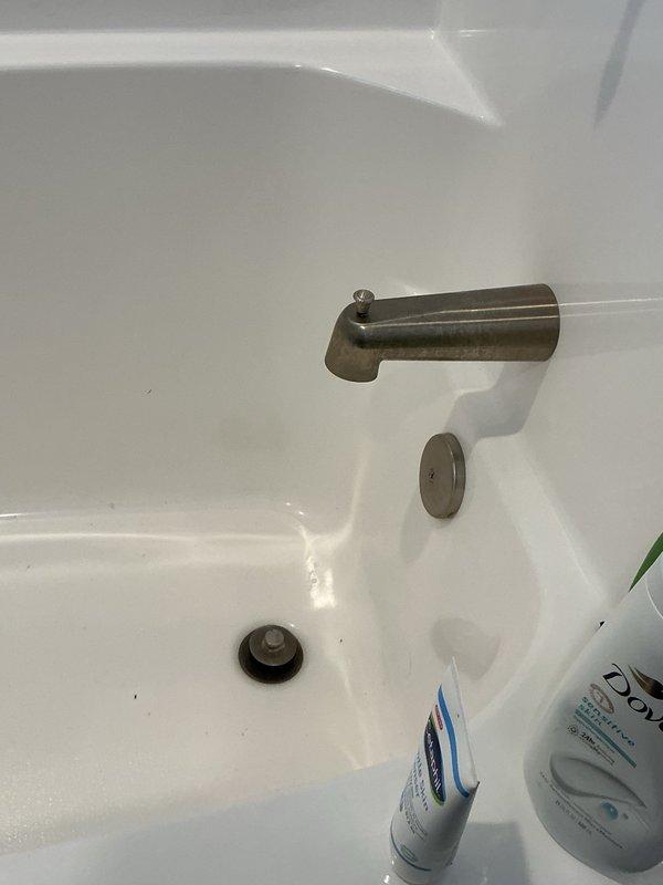 Responded to a multi-level drainage issue affecting both main and upper level bathtubs. The main level tub was experiencing complete backup while the upstairs tub exhibited severely reduced drainage rates. Upon assessment, determined the issue was related to a sewer line obstruction affecting the entire drainage system.

Performed comprehensive drain cleaning procedures on both the downstairs and upstairs tub drains to clear the blockage and restore proper water flow. Following the mechanical cleaning, conducted a camera inspection of the sewer line to verify complete clearance of the obstruction and assess the overall condition of the drainage pipe. The camera inspection confirmed successful removal of the blockage and allowed for documentation of the pipe's interior condition. Both tubs were restored to full drainage capacity with no remaining backup issues.
