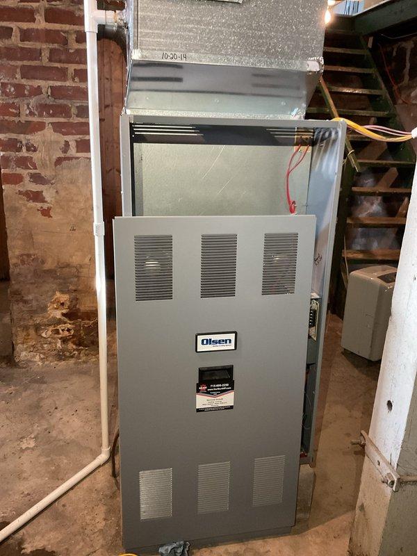 Completed annual maintenance on Olsen oil furnace and air conditioning system as part of rewards membership agreement. Serviced oil furnace including replacement of nozzle and oil filter, performed complete system inspection and operational check. Serviced air conditioning unit per maintenance agreement specifications, verified proper operation of both heating and cooling systems.