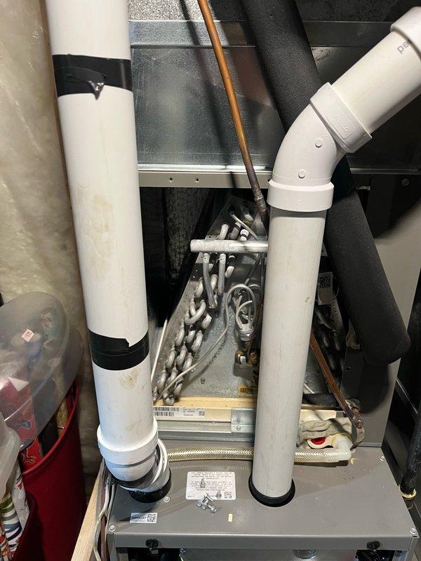 Completed comprehensive AC tune-up on 2-year-old FRP system with no initial concerns reported. Corrected air filter that had been installed backwards during previous service, inspected blower and evaporator coil which were both clean with proper drainage, performed routine electrical inspection, cleaned outdoor condenser coil, and verified system operation through 15-minute runtime test achieving 22°+ temperature differential across the coil. Recommended ordering replacement filter for future maintenance.