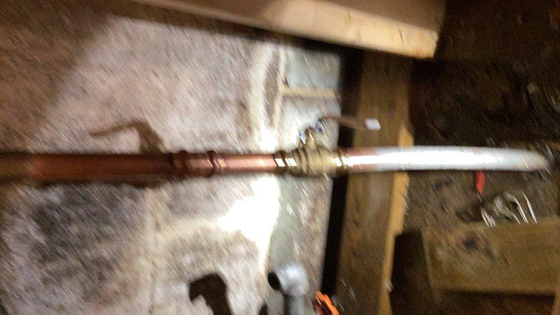 Responded to emergency service call requiring city water shutoff at 8:30am to address failing main water service valve up to 1" before meter. Upon inspection, found severely deteriorated water heater with extensive rust and corrosion on both the unit and primary shutoff valve, indicating age-related failure and potential safety hazards.

Performed comprehensive plumbing system upgrade including complete water heater replacement. Installed new main service valves both before and after the water meter to ensure proper isolation capability for future maintenance. Replaced failed backyard hose spigot to restore exterior water access. Completed interior fixture repairs by installing new angle stop valve and fill valve assembly under downstairs toilet to eliminate leaks and ensure proper operation.

All copper piping connections secured with appropriate fittings and transitions. System tested for leaks and proper water pressure upon restoration of service. Work completed in crawl space and u