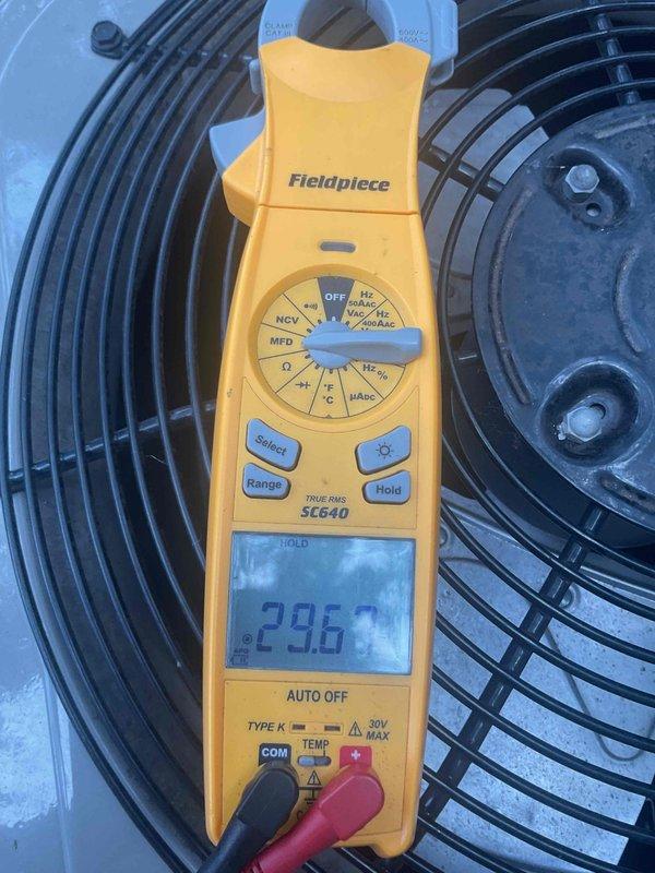 Completed seasonal AC tune-up and identified low subcool readings indicating potential refrigerant leak. Replaced failed hermetic compressor capacitor which was reading below specification. System restored to cooling operation; provided estimate for comprehensive leak detection and repair services to address underlying refrigerant loss issue.
