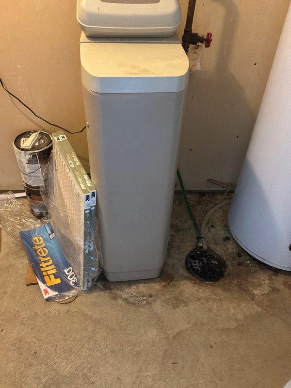 Conducted comprehensive plumbing estimate for water heater replacement in utility room with existing water softener system. Assessed current water heater condition, evaluated copper piping configuration, and documented existing plumbing infrastructure including water softener connections and valve placements. Provided recommendations for water heater replacement options and identified opportunities for general plumbing system improvements throughout the property.