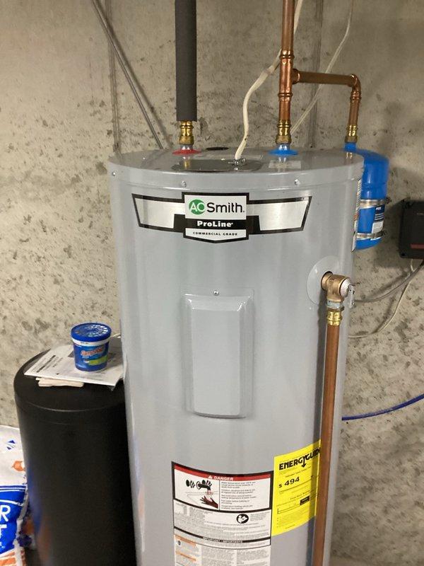 Responded to service call for water heater experiencing premature hot water depletion during showering. Upon inspection of the A.O. Smith ProLine Commercial Grade 50-gallon electric water heater (Model ENT-80), diagnosed faulty lower thermostat as the root cause of inadequate heating performance. Successfully replaced the defective lower thermostat, restoring proper temperature regulation and hot water capacity to the unit.