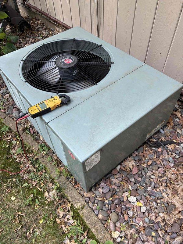 Completed preventative maintenance on residential air conditioning system. Cleaned outdoor condenser unit, verified capacitor and contactor readings within manufacturer specifications, confirmed refrigerant charge adequate, cleared condensate drain line, measured 19-degree temperature differential across evaporator coil, and inspected air filter. Discussed system age and R-22 refrigerant phase-out with homeowner; unit currently operating within acceptable cooling parameters.