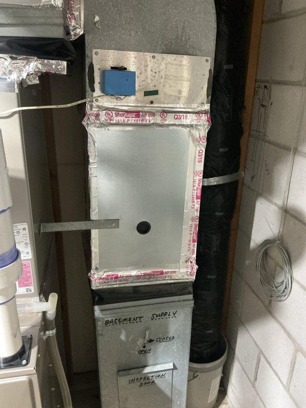 Responded to no-cool complaint on 25-year-old zoned HVAC system with inadequate cooling on second floor. Performed comprehensive diagnostic testing including zone damper operation, temperature split measurement, blower speed verification, and refrigerant level assessment. All system components tested within manufacturer specifications with 20-degree temperature split confirming proper airflow and refrigerant charge. Zone dampers operating correctly and blower fan speeds set appropriately. Identified dirty outdoor coils causing reduced efficiency and increased system workload. Determined insufficient cooling likely attributed to recent flooring removal exposing subfloor, which absorbs heat and increases cooling load on upper level. System operating as designed with no mechanical failures found. Recommended switching to MERV 8 rated air filter to reduce air restriction and improve system performance. Scheduled future estimates for humidifier replacement, air exchanger installation, whole